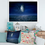 Full Moon Over Dark Ocean At Night