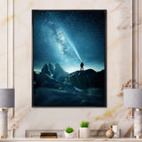 A Man Shining A Light Into The Night Sky