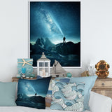 A Man Shining A Light Into The Night Sky