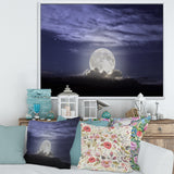 Full Moon Rising In A Cloudy Night