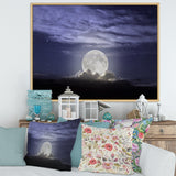 Full Moon Rising In A Cloudy Night