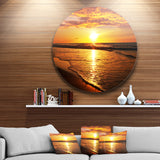 Bright Yellow Sunset over Waves' Beach Metal Circle Wall Art