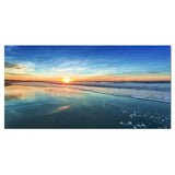 Blue Seashore with Distant Sunset Wall Art