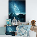 A Man Shining A Light Into The Night Sky