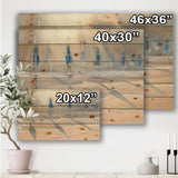 Sunny Sand With Closed Blue Beach Umbrellas - Lake House Print on Natural Pine Wood