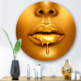 Designart 'Gold Paint Drips From Sexy Woman Lips' Modern Metal Circle Wall Art