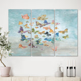 Designart 'Butterflies Dancing I' Wildlife Canvas Artwork - 36x28 - 3 Panels